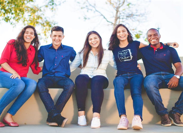 five high school students posing for a photo