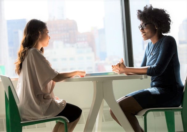 administrator interviewing a job candidate